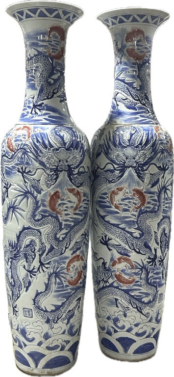 Pair of Monumental Chinese Mingping Temple Vases.: 7.1'Hx22"W. Featuring intricate blue and white patterns with red accents. Imperial dragon amidst swirling waves and clouds, with koi fish. Baluster-form with elongated necks, flared rims with