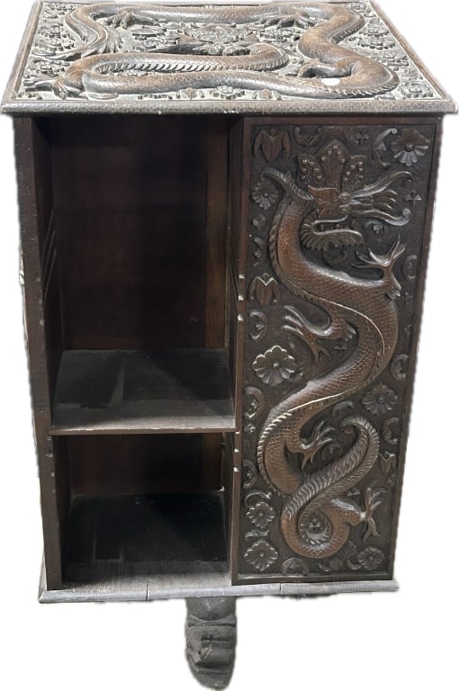 Antique Chinese Dragon-Carved Revolving Bookshelf.: 33"Hx18"Wx18"D. 19th Century rectangular-form high-relief carved rosewood revolving etagere. Top and sides with elaborate carved 5-claw dragons, and carved dragon head feet. Condition: Good with wear,