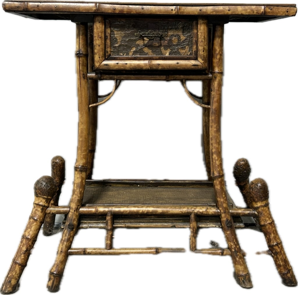 Antique Japonisme Lacquered Bamboo Stand.: 29"Hx27.5"Wx15.5"D. Circa 1880, lacquered woven rattan top and lower shelf, skirt drawer, with tortoise shell finish. Condition: Good with wear. **LOCAL PICKUP MUST BE BY APPT ONLY POSTAUCTION ONLY
