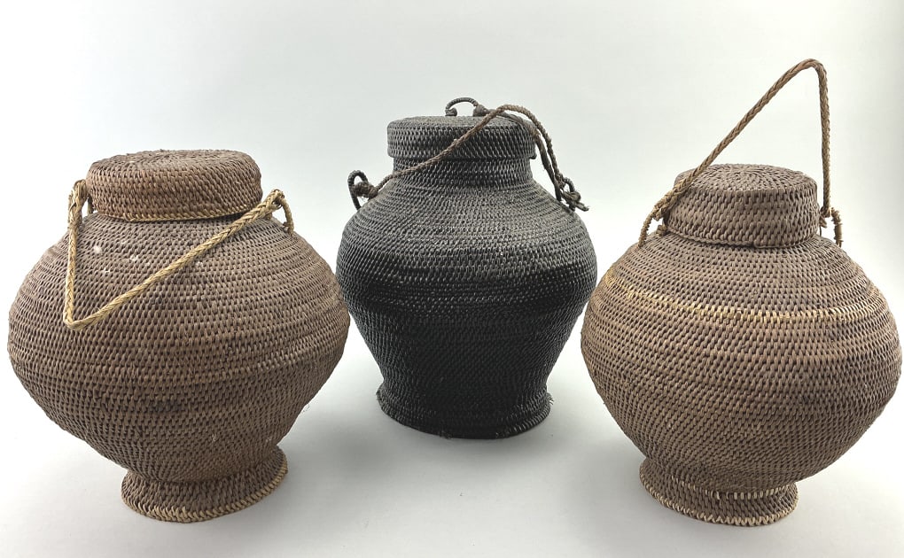 3 Antique Ifugao Ulbong Rice Baskets.: 10-12"H. Produced by Ifugao people of the Philippine highlands of Luzon island, early 20th century, hand-woven bamboo and rattan, used for storing dry rice and beans. Condition: Good with minor loss a