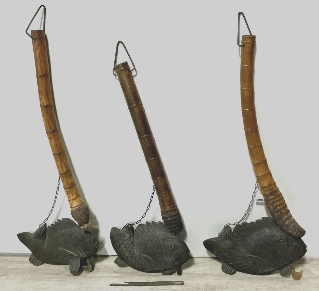 3 Antique Japanese Fish-Form Jizaikagi Hooks.: 52"H. Adjustable trammel hook of carved wood and chain, used to hang a kettle over a Irori fireplace and raised and lowered to control the heat. Condition: good with wear, one is broken on the bottom.