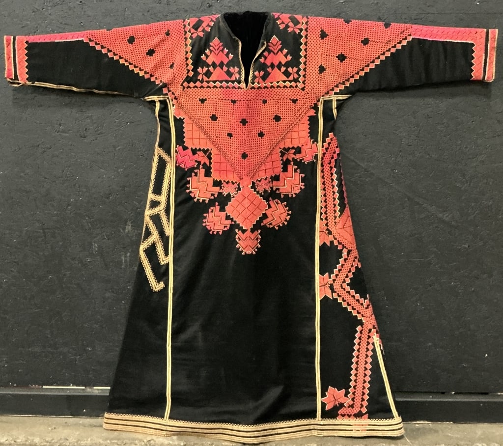 Syrian Ethnic Tribal Embroidered Dress.: 52"Wx52.5"D. Specifically identified as Saraqib Fustan, featuring embroidered tatreez patterns on black fabric. Condition: good with wear. **LOCAL PICKUP MUST BE BY APPT ONLY POSTAUCTION ONLY ON SPECI