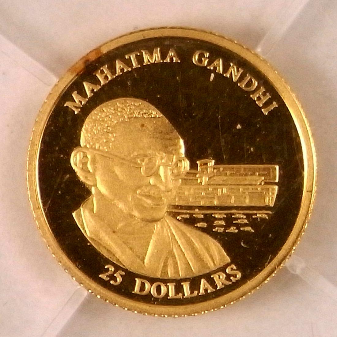 25 Dollars: Liberia / 25 dollars / Gandhi / 2001 / 0.75 grs / Gold / Numismatic