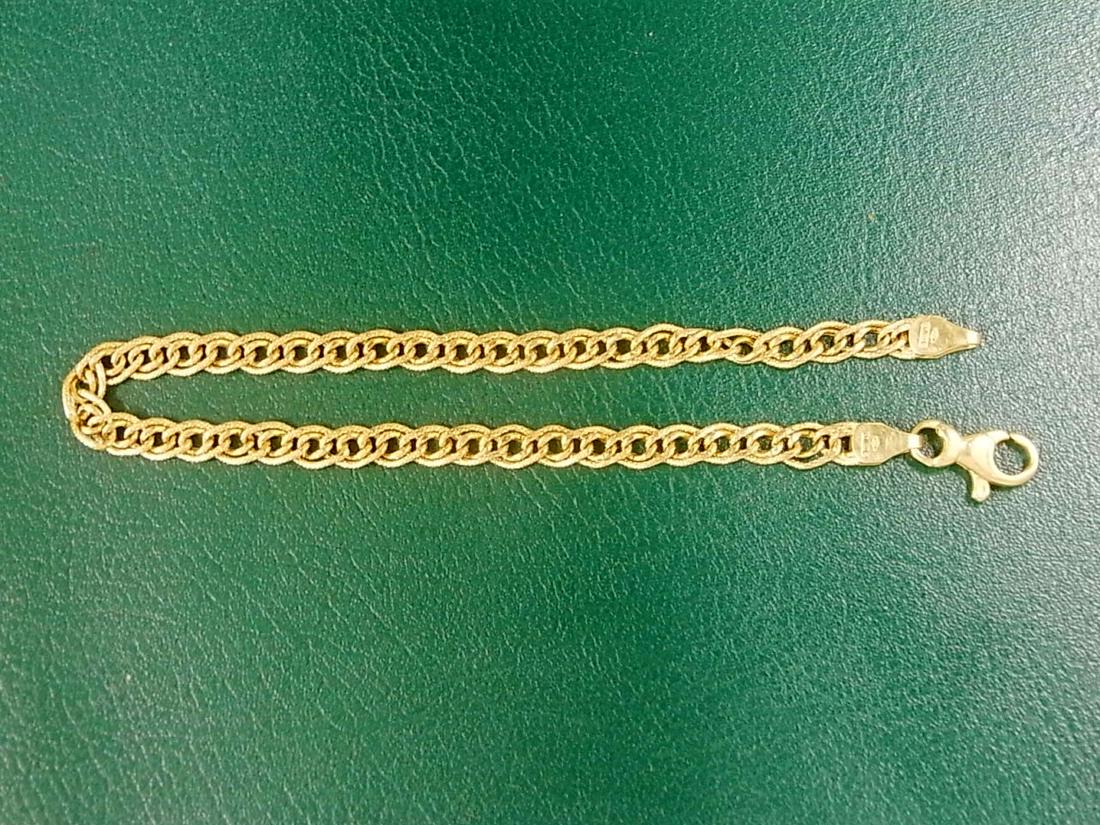 Bracelet double: 18 Karat / Yellow gold 18k / double curb chain / 19.5 cm / 4.38 grs