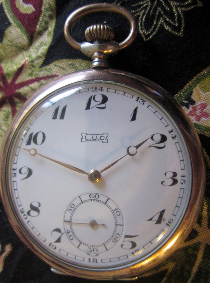 LUC Chopard Pocket Watch Cam Regulator .800 Silver Case: This handsome watch features a 24 hour face with open gold spear hands. It is 15 jewels and comes in a .800 silver case with serial number 98529.