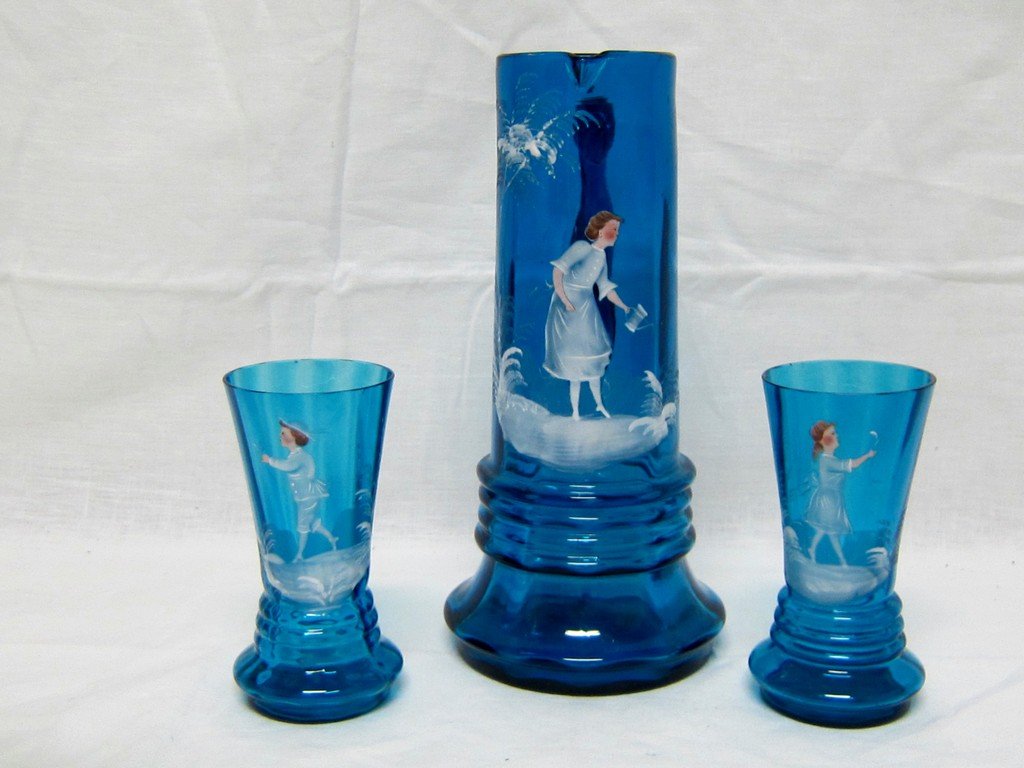 “Mary Gregory” Blue Hand Painted Water Set: Measurements: Pitcher-10”-High 4.5”-Wide at Base Tumblers-6”-Wide 2.25”-Wide at Base