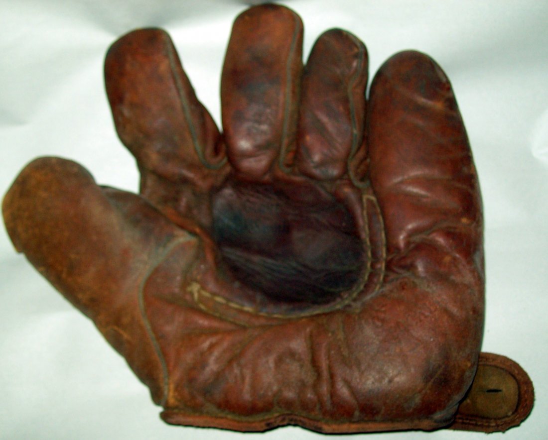 Vintage 1940s Baseball Glove: This wonderful old glove would make a great addition to any collection or use it to accent a den or man cave.