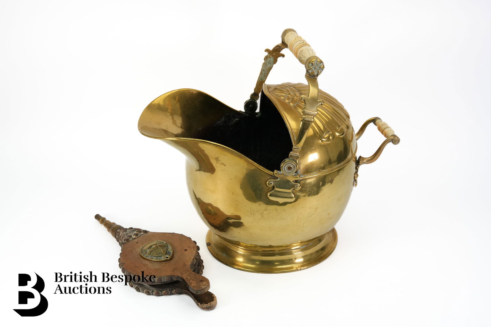 Brass Coal Scuttle and Bellows: Brass coal scuttle and wood bellows, originally from the Old Forge Cockington. (2)