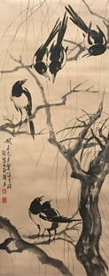 A Chinese Birds Painting Xu Beihong: A Chinese scroll ink and watercolor on paper by Xu Beihong featuring birds and tree. Artist signed and stamped with two red seals. Dated 1943.Height 105 cm. Width 41 cm.