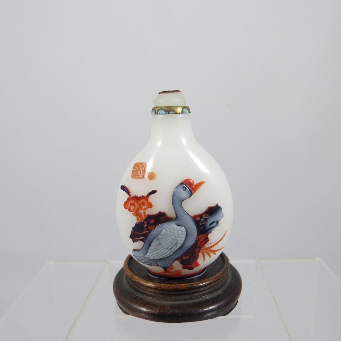 Chinese Qing Dynasty Glass Snuff Bottle: Chinese Qing Dynasty Peking Glass Snuff Bottle featuring Lingzhi, a crane and a Shoulao. Artist seal mark Provenance: Mr. Paul Stern, acquired from J. M. HU. H: 2 5/8"