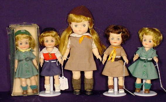Group of 5 Effanbee Plastic Scout Dolls NR: Group of 5 Effanbee plastic Scout dolls: two 1965 Fluffie Girl Scouts, one with box; one 1966 Fluffie Girl Scout; one 1966 Brownie and one 1966 Campfire Girl; all have plastic jointed bodies, sleep ey
