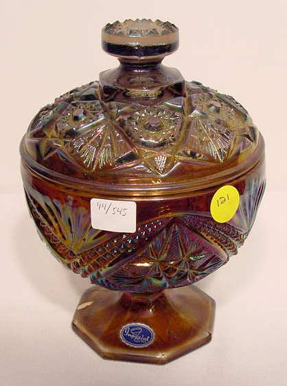 Imperial Peacock Curved Star Covered Jar: Please see the other over 400 similar lots in this auction. Signed Imperial Carnival Glass covered jar, peacock, 452 1/2 Curved Star pattern, w/ 1 PL, 7 3/4" t As produced, no problem condition. No Re