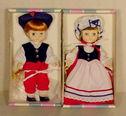 Effanbee Punkin Boy & Girl Dolls NR: 2 Effanbee dolls: No. 1314 Punkin Girl; No. 1365 Punkin Boy. (All original boxes are in as is and some rough condition.) 11"