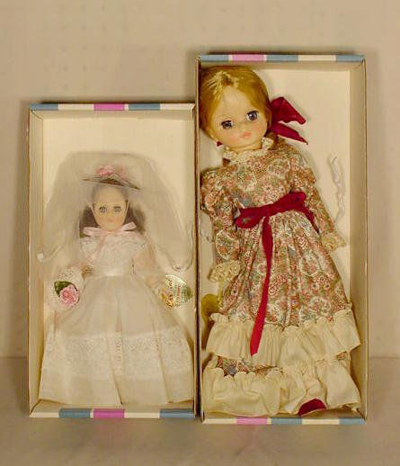 2 Effanbee Dolls: # 1185 & # 1558 NR: 2 Effanbee dolls. No. 1185 Bride 12"; No. 1558 Blonde 17". (All original boxes are in as is and some rough condition.)