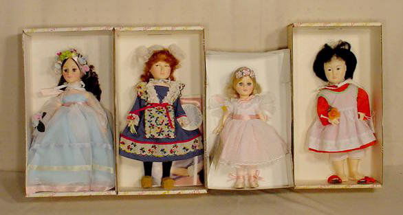 Effanbee Sugar Plum Fairy, Orange Blossom NR: 4 Effanbee dolls. No. 1173 Sugar Plum Fairy; No. 1312 Flower Girl; No. 7501 Orange Blossom; No. 7361 E. Hibel Flower Girl. (All original boxes are in as is and some rough condition.) 13"