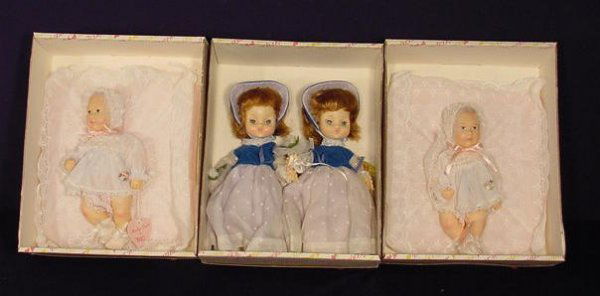 4 Effanbee Dolls: Baby Lisa & Twins NR: 4 Effanbee Dolls: 2 of # 1012 Baby Lisa, 9" T; # 3324 Brunette Twins, in original boxes. 11" T