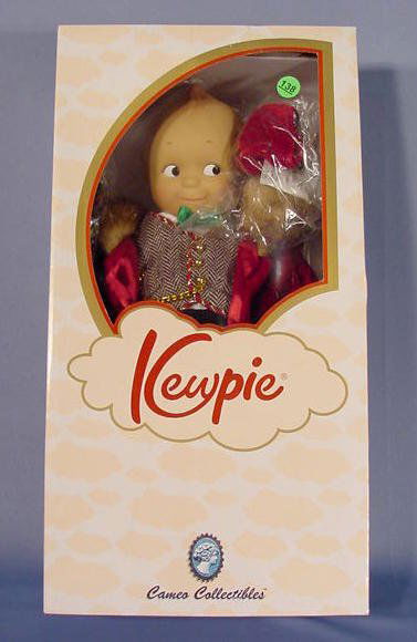 Cameo Collectible Kewpie Old World Santa Doll NR: Cameo Collectible Kewpie Old World Santa Doll in original box with certificates, tags and doll stand. Effanbee #V3064 (Mint in box) 16" T