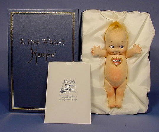 R. John Wright Felt Kewpie in Original Box NR: R. John Wright Felt Kewpie in it's original box. #40 of 1000 made. Circa "2000", with certificates, invoice, registration card, stickers and tags. "New in box" condition. 8" T