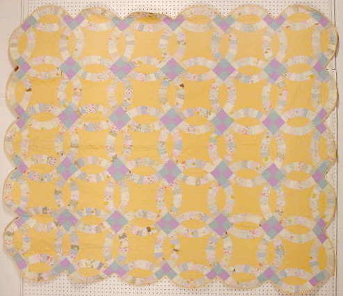 Peach Double Wedding Ring Quilt NR: Please see the over 125 Yard Longs & Flue Covers as well as the many other quality items in this auction Peach Color Background Double Wedding Ring Quilt 86" T. x 73 1/4" W. No Re