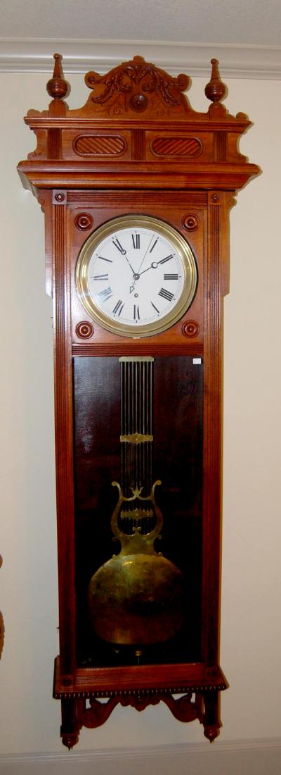 Cherry Waterbury No. 60 Wall Clock: TO with an unsigned: Description: Cherry Waterbury No. 60 Wall Clock: TO with an unsigned porcelain dial, sweep seconds, dead beat escapement, the weight, a large brass pendylum and Waterbury beat scale. Has not been test