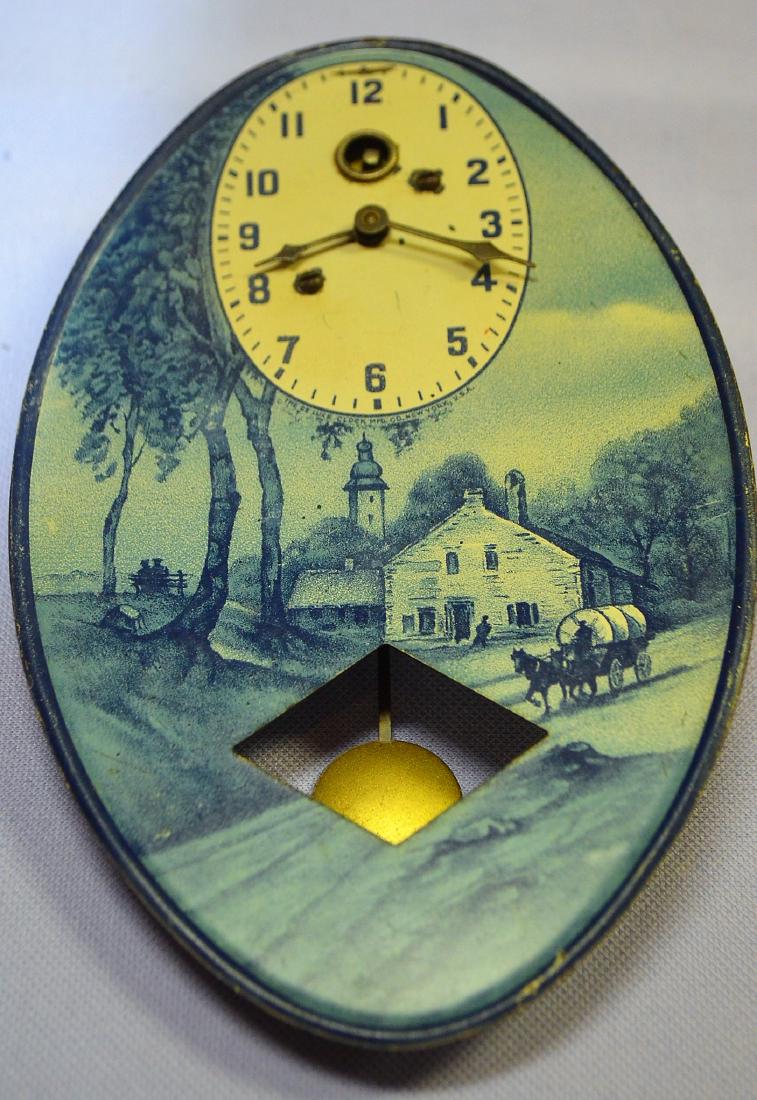 Lux Clock Co. Tin Litho Covered Wagon Pendulette Clock: (1 of 4)