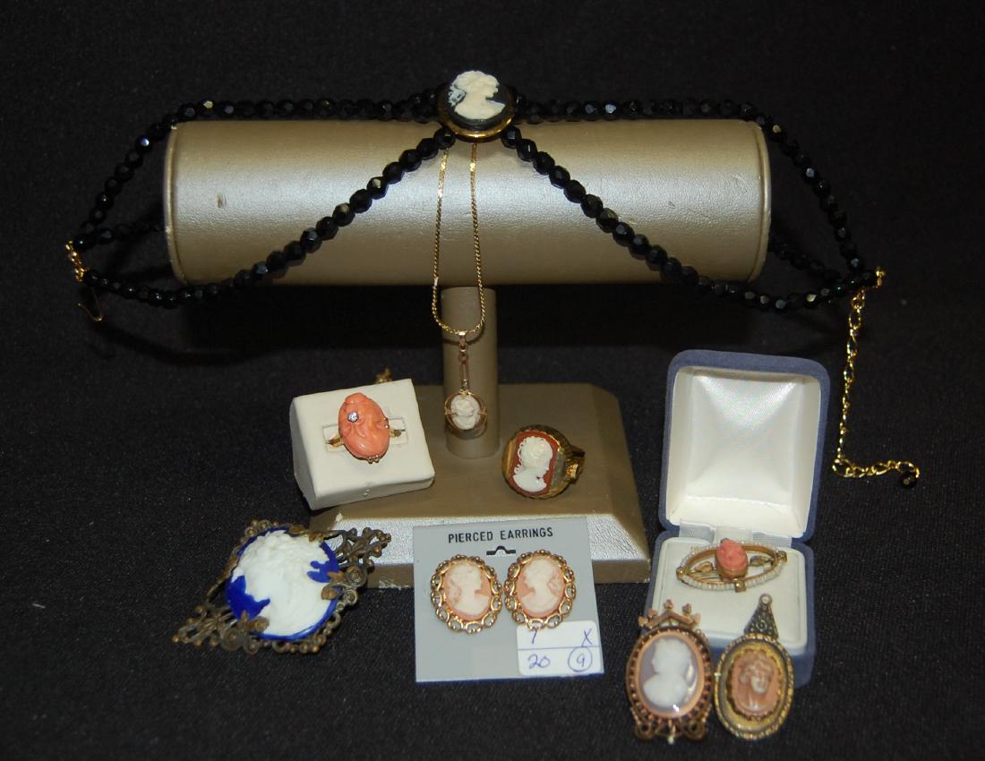 9 Pieces Unmarked Cameo Style Jewelry: 9 Pieces Unmarked Cameo Style Jewelry: 1.) Ring/Watch with faux cameo top that slides to reveal the time. (It is not working at this time.); 2.) 3 strand choker of black faceted beads and a black and 