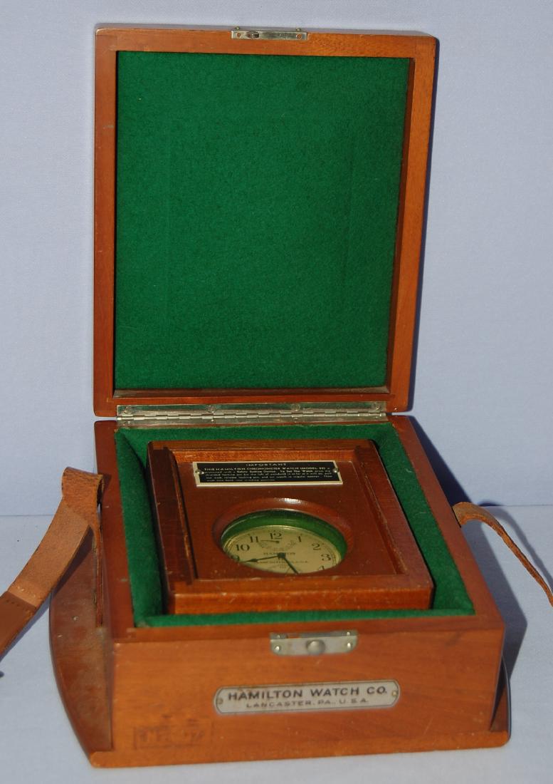 Hamilton DBL Boxed Chronometer Watch: Hamilton DBL Boxed Chronometer Watch, Model 22, signed Hamilton dial with seconds bit; marked on the case Bureau of Ships U.S. Navy N. 7007-1942 Chronometer Watch; inner box has an instruction tag; ou