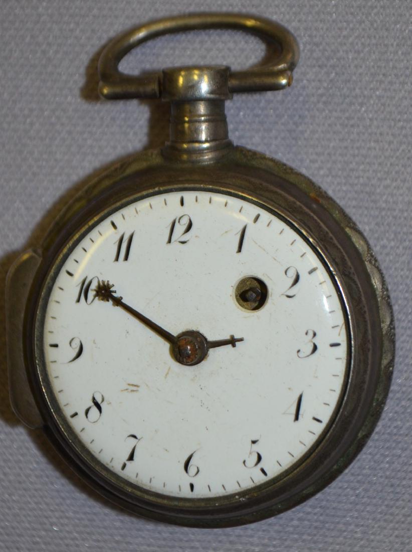 Fusee Chain Driven OF Silver Pocket Watch: Fusee Chain Driven OF Silver Pocket Watch: With an unsigned porcelain dial, an unsigned movement, front KW and unusual hands. This watch has Swiss hallmarks. (There is no key with the watch. The case 