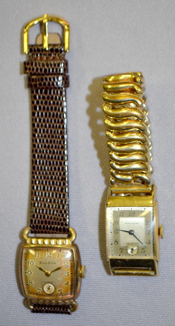 2 Men's Wristwatches, Bulova and Waltham: 2 Men's Wristwatches, Bulova and Waltham: 1.) Bulova 10AX 15J in a YGF case with a leather band.; 2.) Waltham 750B 17J in a YGF case with a metal stretch band. Both watches are working at this time. B