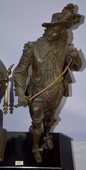 Ans. Don Caesar & Don Juan Statue Clock