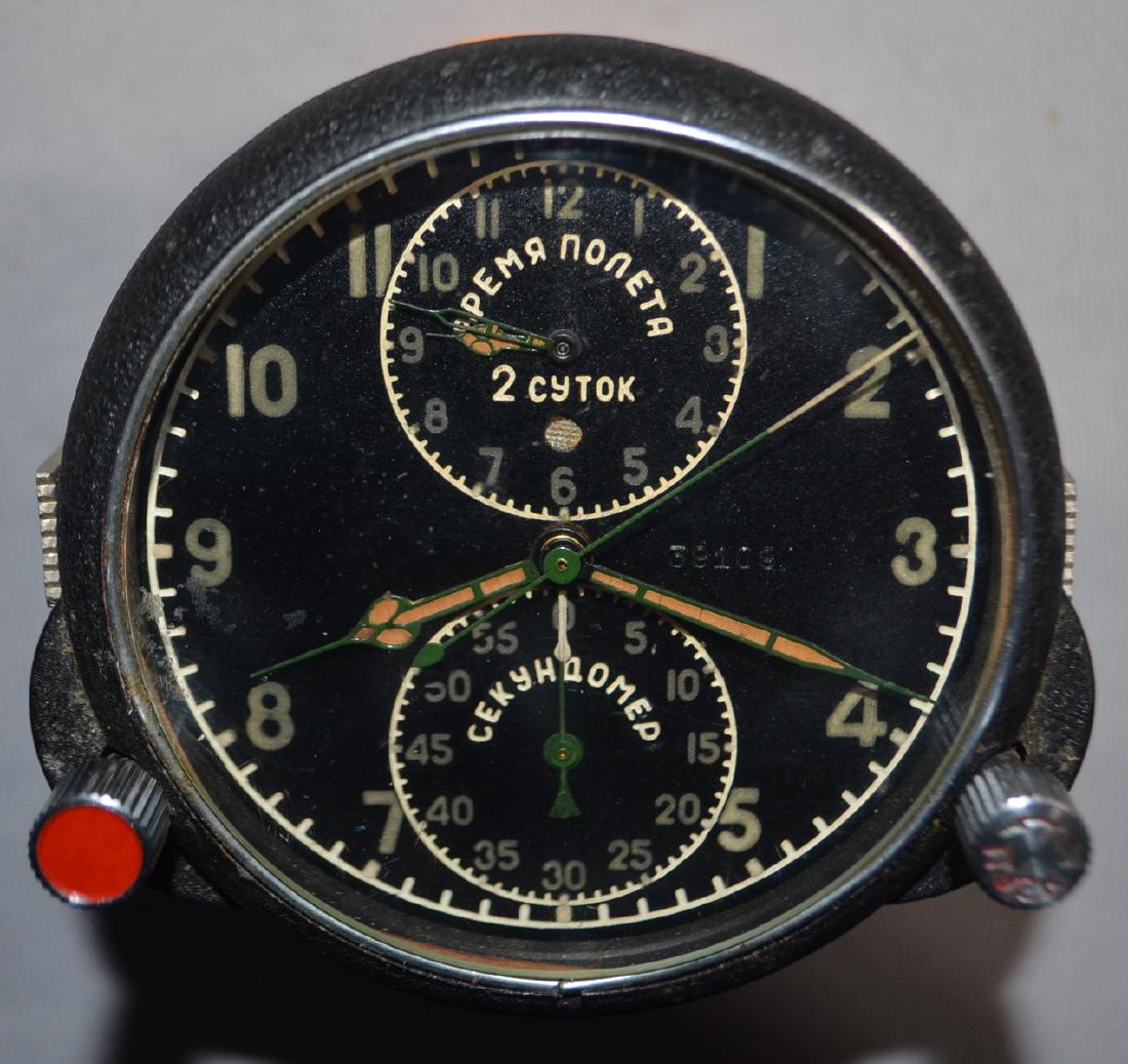 Russian MIG - 15 3-Dial Clock: Russian MIG - 15 3-Dial Clock: It has a black dial with Russian wording on it. The metal case is marked "A4C-T 270 530". The clock comes in a Styrofoam fitted container and there are some Russian pape
