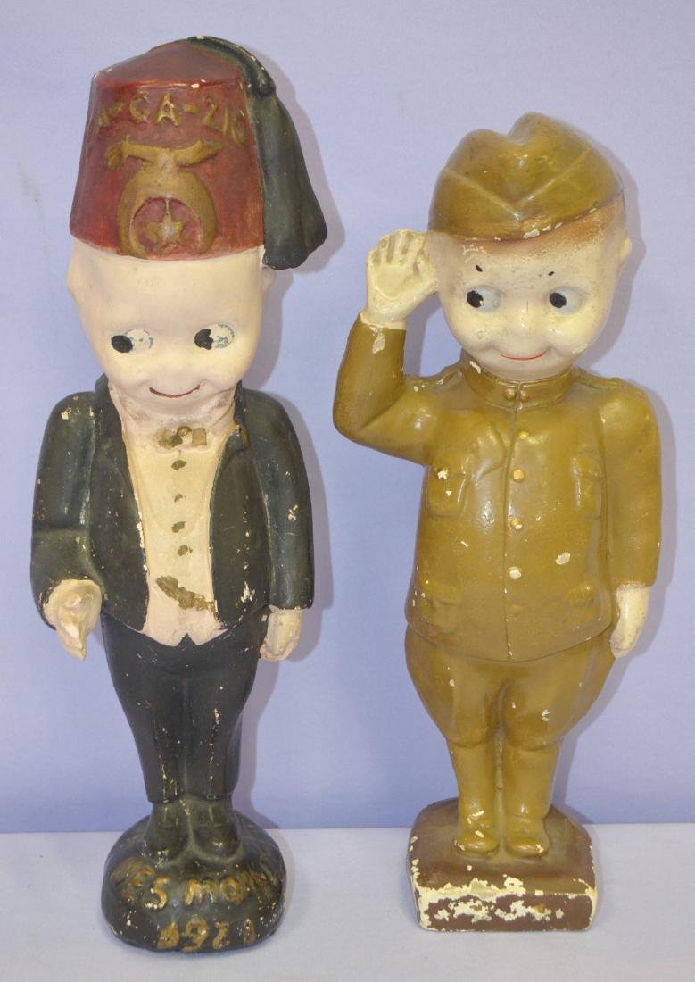 2 Kewpie Plaster Carnival Prizes: Shriner +: 2 Kewpie Plaster Carnival Prizes, Shriner and Soldier: 1.) ZA-GA-Zig Des Moines 1921 Masonic Shriner figurine. (The paint is chipped. There is a chip on one hand.); 2.) Saluting Soldier Boy Figurine i