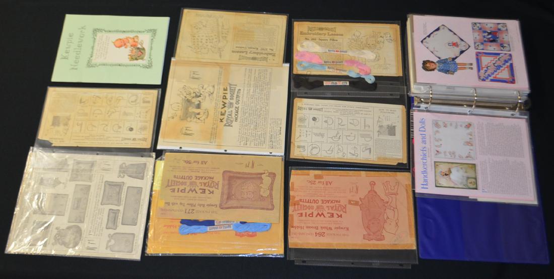 Large Collection of Kewpie Royal Society Items: Large Collection of Kewpie Royal Society Items: Includes photographs and copies of needle point handkerchief from doll collection magazines and Kewpie needle work. Sells as is, where is.