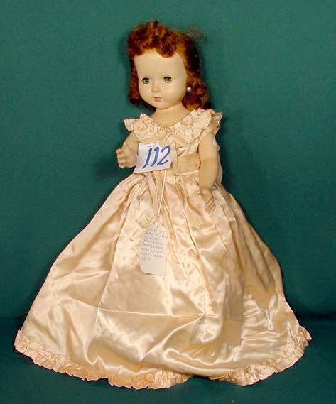 Effanbee Hard Plastic Doll NR: Please see our many other fine dolls up for sale! Hard plastic Effanbee on head, sleep eyes, painted features, fake earrings, jointed body and limbs, wig 18" T. No Reserve! All lots are listed to