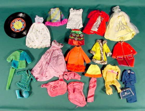 Group Lot of 13 Barbie & Francie Outfits NR: Please see our many other fine dolls up for sale! Group lot of 13 Barbie and Francie outfits and Barbie record "Fly Children Fly" No Reserve! Please see our many other fine dolls up for sale!