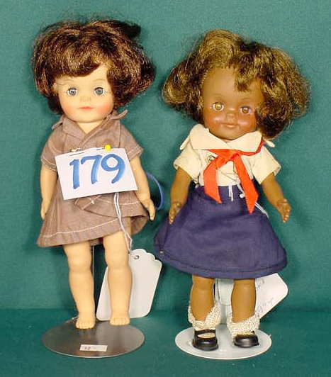 Pair of 1965 Effanbee Vinyl Dolls NR: Please see our many other fine dolls up for sale! Pair of Vinyl Effanbee Dolls, ©1965, sleep eyes, painted features, jointed arms and legs, rooted hair, (white doll has discoloration to arms) 8 and 9