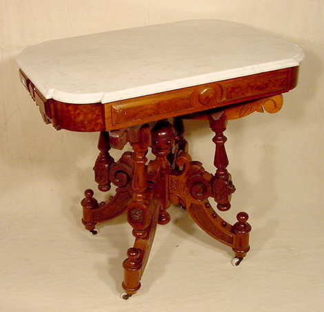 White Shaped Corner Marble Top Table Lion's Heads: Please see the hundreds of other quality antiques in this sale! Ornate white shaped corner marble top table with 4 lion's head medallions on legs, burl trim (Light, old refinish, old no harm 3" hairli
