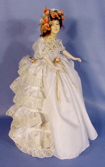 Composition & Bisque Doll Lamp: Composition & Bisque Doll Lamp: composition head with painted features; bisque arms marked Bavaria; wire form body. (Some cracking and chips to composition.) 15" tall