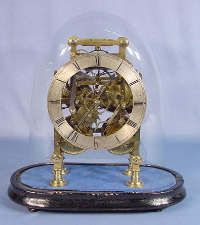2 Train Brass Skeleton Clock w/Glass Dome: 2 Train Brass Skeleton Clock w/Glass Dome: time and bell striking with 5 7/8" silvered dial. The double fusee movement is not marked or numbered. (The dial has some discoloration, the paint on the woo