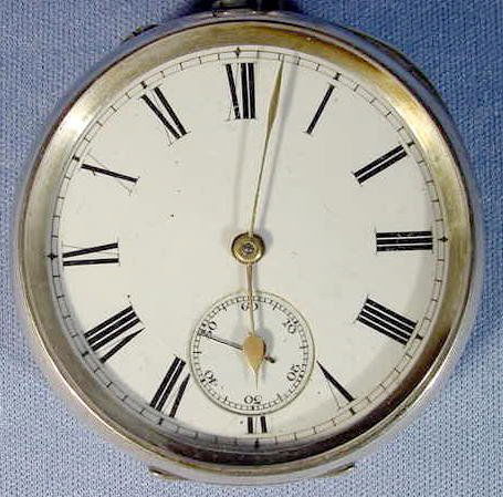 Swiss Made Pocket Watch in Sterling Silver Case: Swiss Made Pocket Watch in Sterling Silver Case: with large sterling chain attached; the dust cover is engraved-"Makers to Her Majesty the Queen-Sir John Bennett LTD, 6S Cheapside, London". The stem w