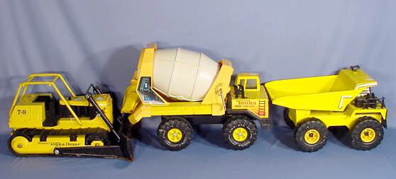 3 Tonka Toy Pressed Steel Construction Vehicles: 3 Tonka Toy Pressed Steeel Vehicles: (1) Turbo Diesel Cement Truck, there is some hard plastic incorperated with the steel frame. 20" L (2) Big Brusier Dump Truck 15 1/2" L (3) T-9 Mighty Dozer 17" L