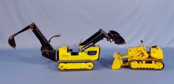 2 Metal Construction Toys: Tonka & Ertl: 2 Metal Construction Toys: 1.) Tonka T-6 Dozer with front scoop and rear shovel, 21" long. 2.) Ertl U.S.A. Allis Chalmers Dozer with scoop front, cast aluminum, 9 1/2" long. (The Tonka has some scatte