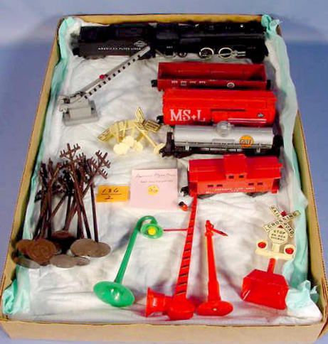 American Flyer Train Set w/Some Accessories: American Flyer Train Set w/Some Accessories: Engine No.307, 9" long; Reading Lines tender, 7" long; PRR No.805 gondola, 8" long; MSTL No.24048 box car, 8" long; Gulf 925 tanker, 8" long; A.F.L. 806 ca