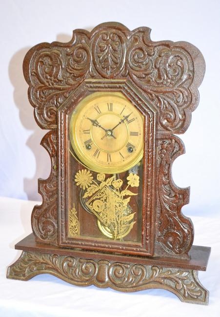 Waterbury Walnut “Uncas” Kitchen Clock. T&S, signed