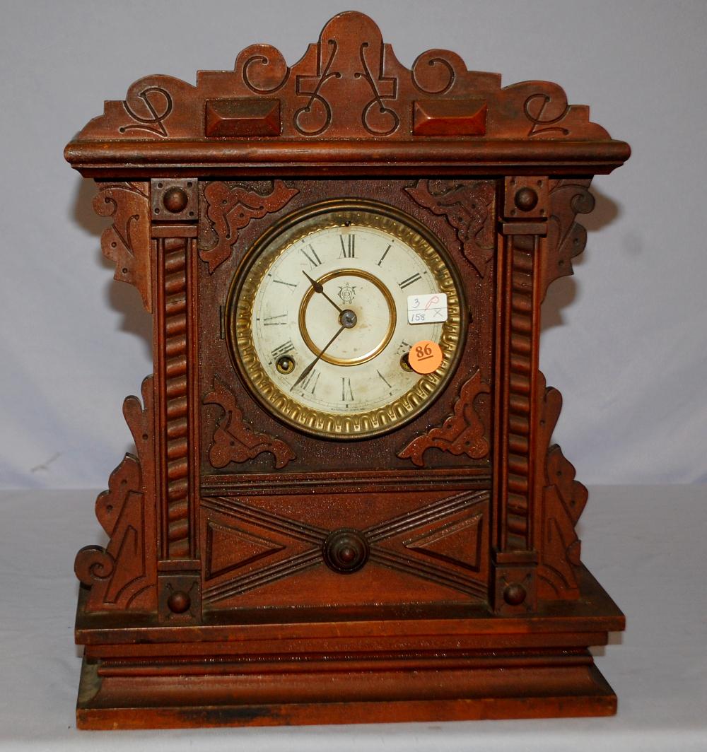Waterbury Cabinet Clock: T & S; signed paper dial; (1 of 3)