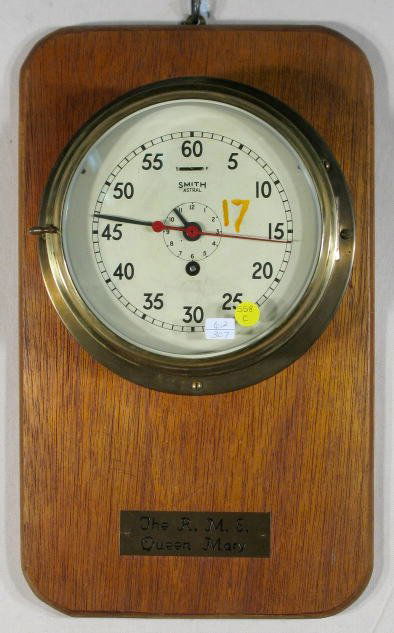 Brass Smith Astral shipping. Thank You. s Clock: Brass Smith Astral shipping. Thank You. s Clock: with second hand sweep applied to a board with plaque. "The R.M.S. Queen Mary", orange paint #17 on dial. 8" dial. No condition problems. 20" x 12". Al