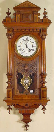 Lenzkirch Time & Gong Striking Wall Clock: Lenzkirch Time & Gong Striking Wall Clock: the movement is signed and also marked, A.V.G., 24, 1 Million, and 273579. With a 7" recessed center dial and fancy 2 color pendulum. It has a winged cherub