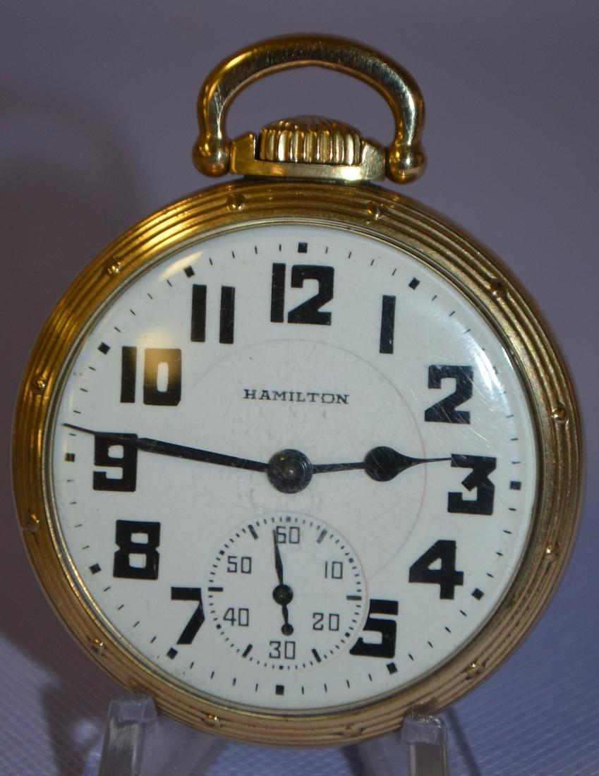 Hamilton 950B, 23J, 16S, OF Pocket Watch: LS BRG Adj to: Hamilton 950B, 23J, 16S, OF Pocket Watch: LS BRG Adj to Temp & 6P, GF RGJS DMK No. 51194, running. DSD looks ok, in a yellow Hamilton 10kGF SF&B case No K389668. The case back is buffed, showing scuff