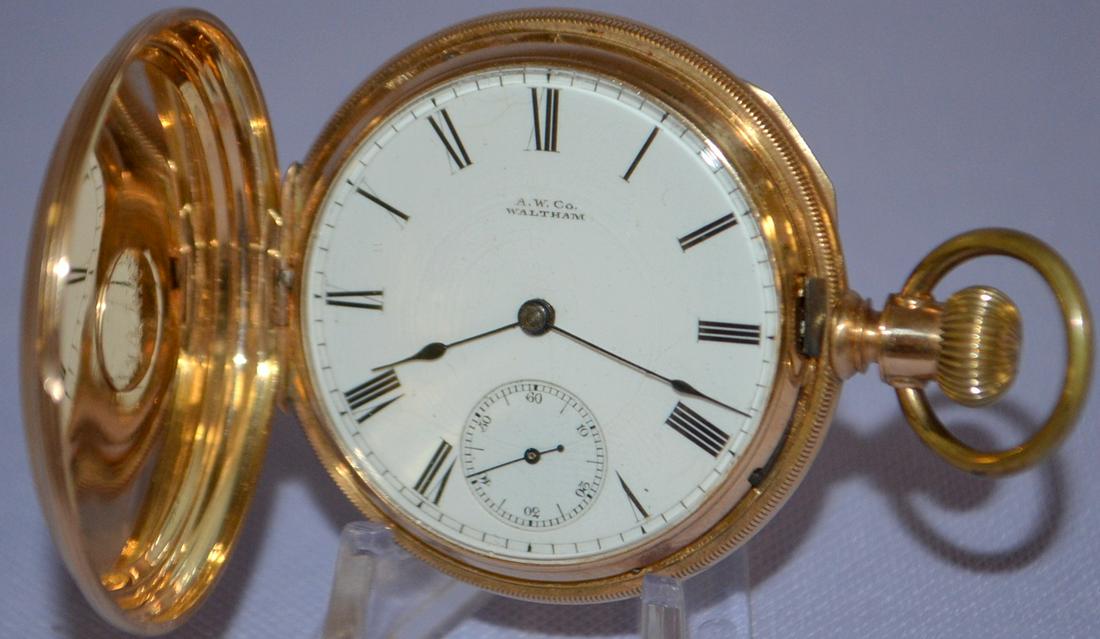AM Watch Co. 14k Waltham Hillside Pocket Watch: 7j,: AM Watch Co. 14k Waltham Hillside Pocket Watch: 7j, 16s, LS M1868 hunting case No 1309130, running in a yellow gold case marked 14K No. 17401. The machined covers look ok; minor wear. The SSD has a ha