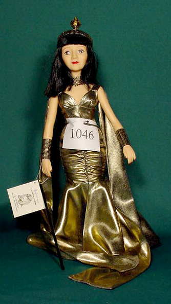 Vinyl Effanbee Claudette Colbert as Cleopatra NR: Please see the hundreds of other quality dolls in this sale! Vinyl Effanbee Claudette Colbert as Cleopatra, Legend Series, 16 1/2" T No Reserve! Note: Successful Buyers will have their credit cards ch